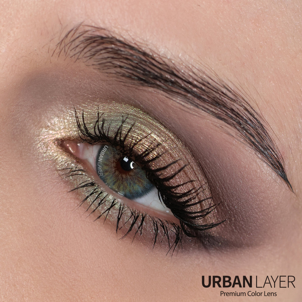 Light blue Urban Layer colored contact lenses in a clear packaging, showcasing the vibrant hue and design.