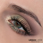 Light blue Urban Layer colored contact lenses in a clear packaging, showcasing the vibrant hue and design.